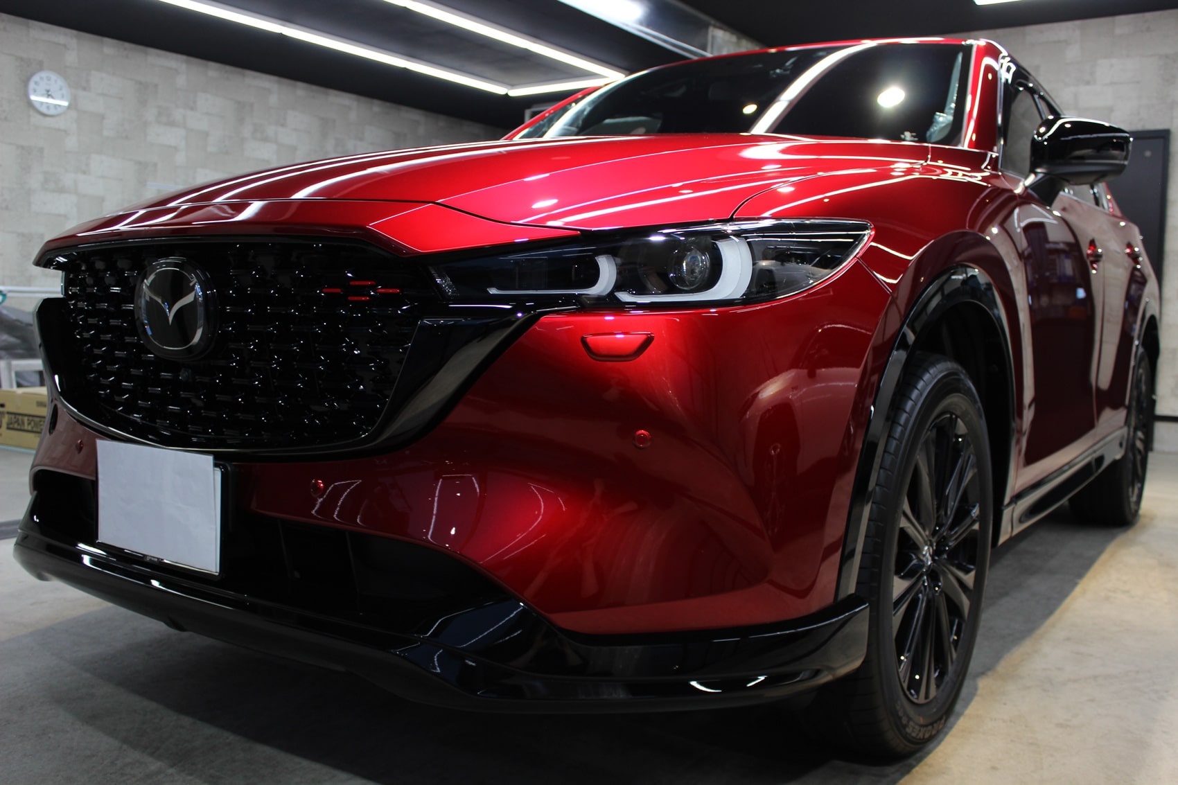 マツダ CX-5 ソウルレッドクリスタルメタリック フロントバンパー左